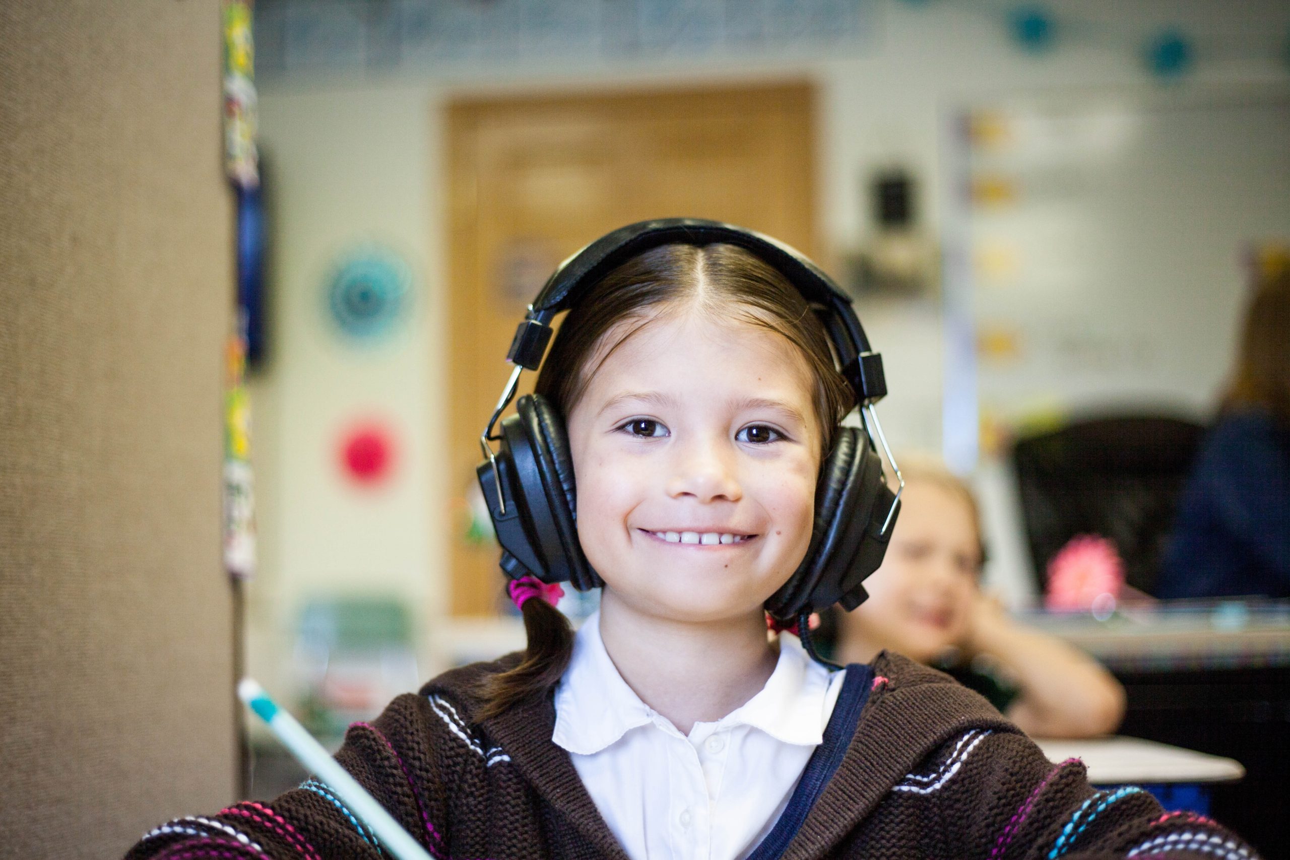 girl wearing black head phone